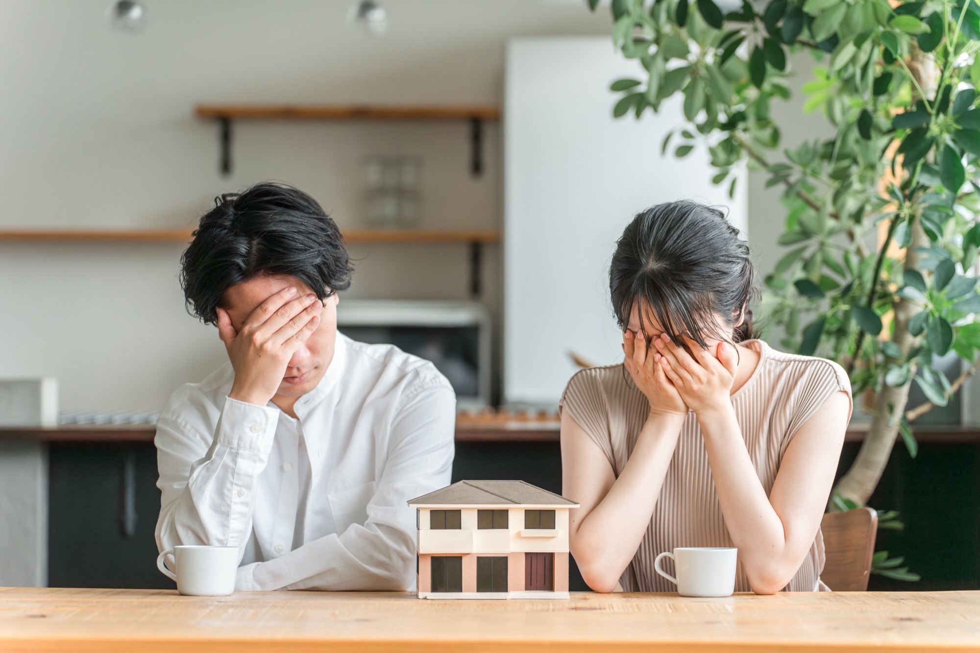 失敗を後悔する夫婦